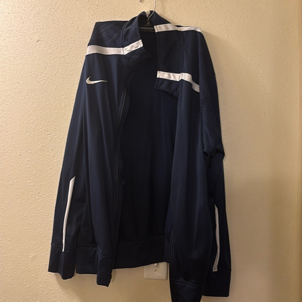 Small blue Nike track jacket